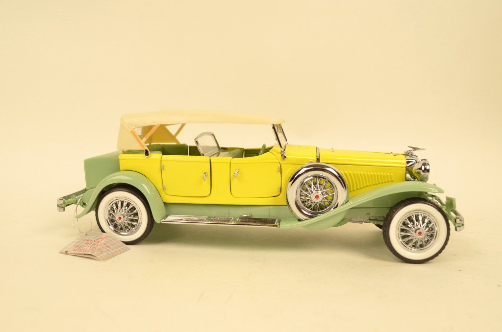 1930 Duesenberg Franklin Mint 1:24 Scale Model: $18 Shipping/handling/insurance (up to 100) shipped in the continental United States. We do not combine shipping as the packages are sealed and labeled immediately after the item is sold. Internationa