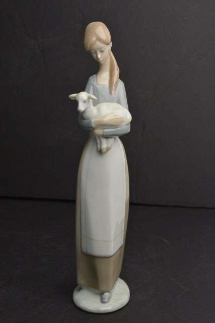 *Lladro 4505 Girl W/ Lamb Porcelain Figurine: Contact our recommended 3rd party for profit shipper Pak Mail at (260) 637-4809 for shipping quote PRIOR to bidding. Scheerer WILL NOT ship this item under any circumstances, no exceptions. Lladro #45