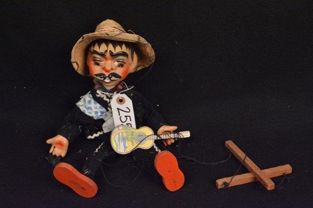 *Vintage Mexican Marionette Toy: Vintage Mexican Marionette. 14.5 in long. Puppet has guitar and gun in hands. Some wear on face. Contact our recommended 3rd party "for profit" shipper Pak Mail at (260) 637-4809 or Pakmail419@yahoo.c