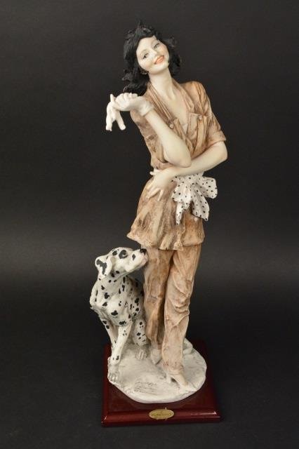 *Florence Giuseppe Armani Figurine Marina: Florence, Original Giuseppe Armani Figuirine, Model 649/C Marina. Lady posing with Dalmation, comes on wood base, with COA and in original box with packaging. Limited Edition 1413/5000. Small chip on