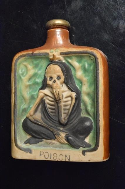 Poison Skeleton Japan Flask Halloween Collectible: Poison skeleton porcelain flask bottle. Made in Japan. Halloween collectible. Contact our recommended 3rd party "for profit" shipper Pak Mail at (260) 637-4809 or Pakmail419@yahoo.com for shipping quo