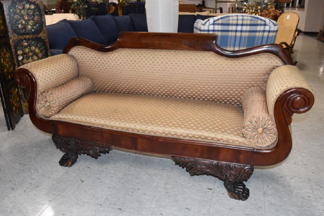 Antique Mahogany Scroll Arm Settee W/ Claw Feet: Antique mahogany scroll arm settee w/ claw feet, leaf design carved legs, gold butterscotch fabric, rolled arms, (2) bolster pillows. 71" L x 22" W x 35.5" H. Contact our recommended 3rd party "for pr