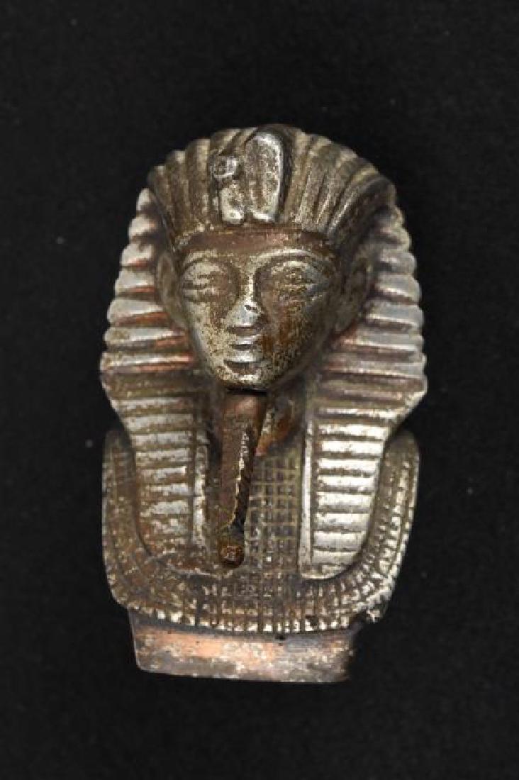King Tut Egyptian Pharaoh Paperweight: King Tut Eqyptian Pharoah metal paperweight, 3.5". Pharoah is threaded on bottom. Tape measure pictured is NOT for sale, used as a reference point for size only. Contact our recommended 3rd party "for
