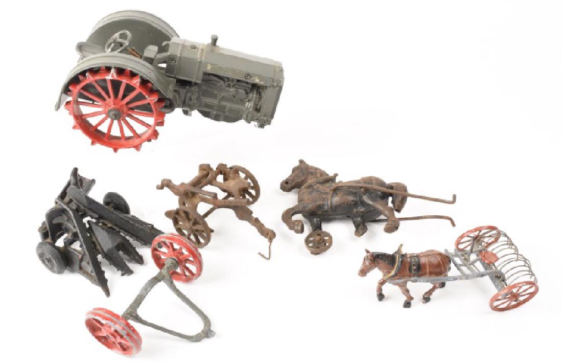 Wilkens?, Arcade & Misc. Farm Toy Implements: ERTL Case tractor toy. Arcade 2 row corn harvestor. Britains hay rake. Possible? Cast iron horse from Wilkens? hay rake (broken leg). Contact our recommended 3rd party "for profit" shipper Pak Mail at