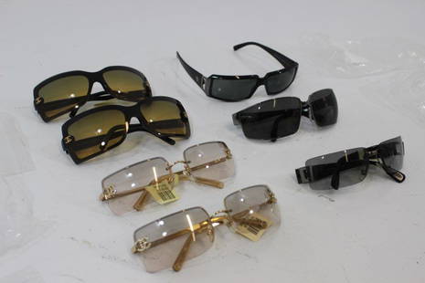 Bag Of Designer Authentic Womens Sunglasses: 7 pairs of designer sunglasses by Chanel, Versace, Bvlgari, and Prada with MINOR BLEMISHES most likely undetectable to the consumer. Retail value $1500-$1800, verified by original price tags still att