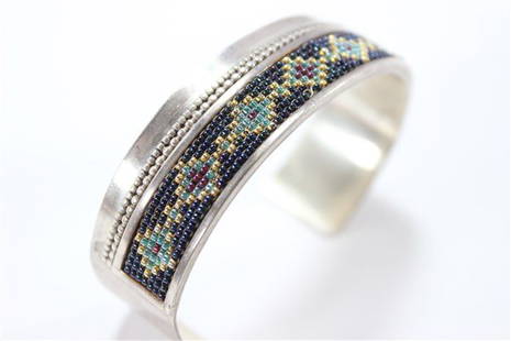 Sterling Bracelet with Beaded Inlay: Sterling bracelet with inlay bead work, personalized inside. Approx 40.1 grams.