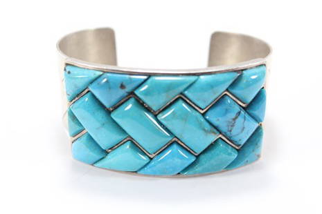 Turquoise Navajo Sterling Silver Bracelet: 80.4 grams, sterling silver and turquoise.