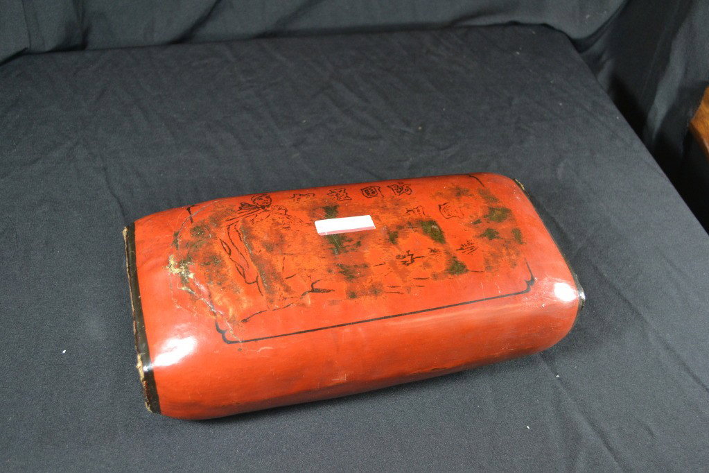 chinese leather pillow: red leather .Qing period . 80 - 100 yrs old .13" long 6" wide. rare found, nice decor.