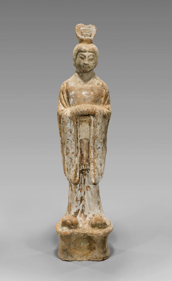 TALL SUI DYNASTY POTTERY FIGURE (1 of 2)