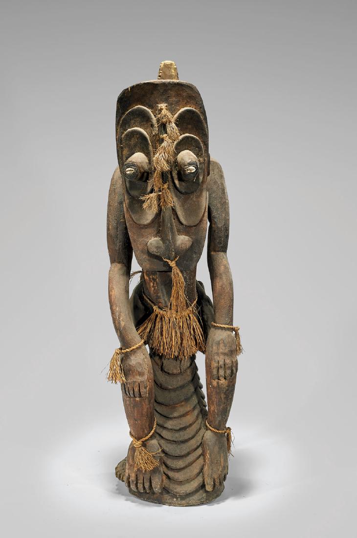 LARGE OCEANIC WOOD FIGURE WITH CROCODILE (1 of 2)