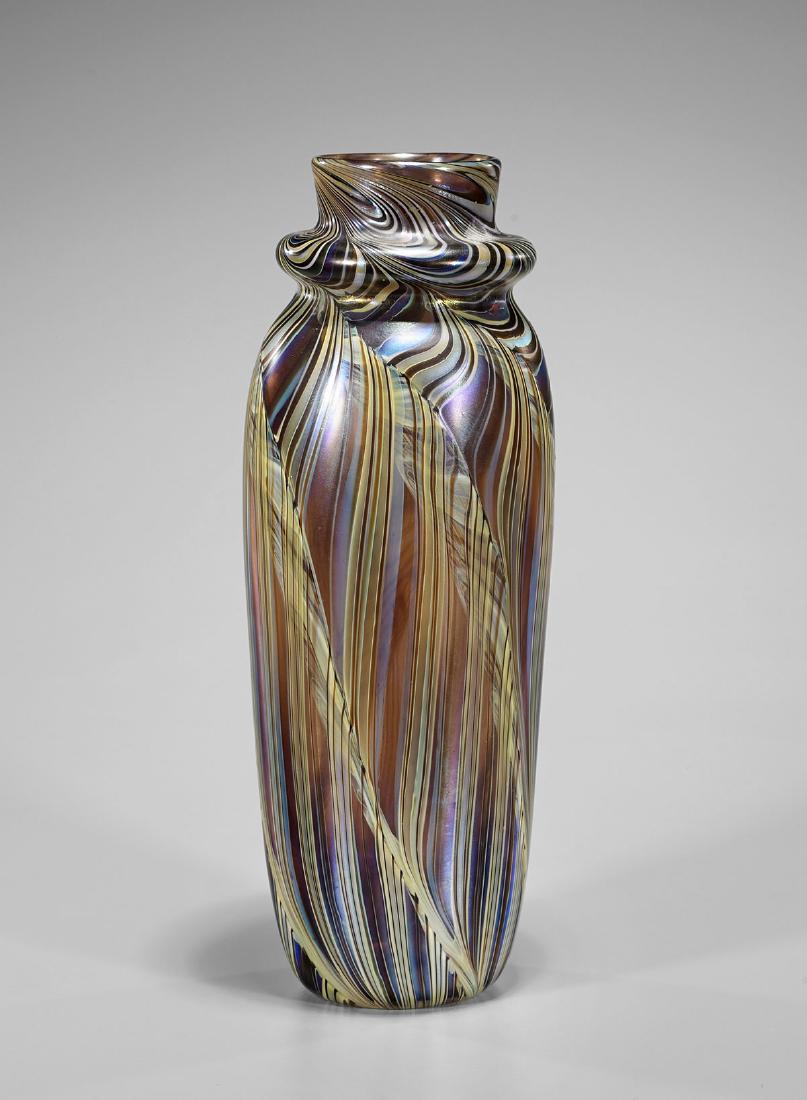 Iridescent Art Glass Vase by Orient & Flume: Iridescent art glass vase by Orient & Flume; of ribboned, swirling design; signed and dated 1985 to base; H: 15 1/4" (approx.)