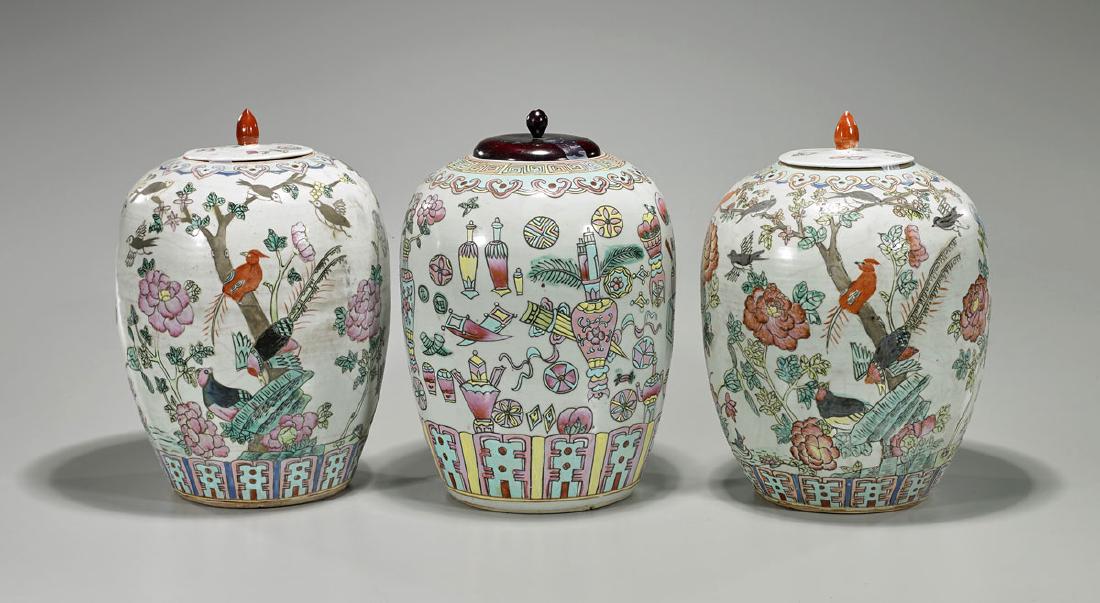 Group of Three Old Famille Rose Jars: Group of three old Famille Rose enameled covered porcelain jars, each of ovoid form, including: pair depicting birds amid flora to body, each with porcelain cover; together with one showing precious v