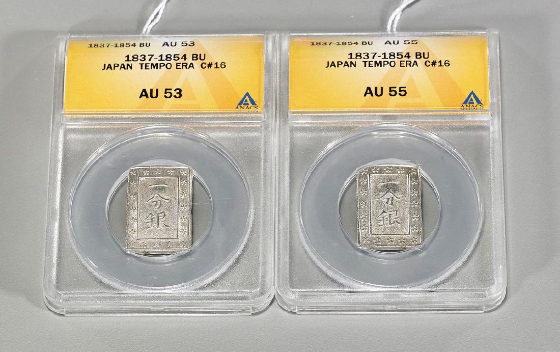 Two Tempo Era Silver Bu Coins: Two Japanese silver bu coins; of the Tempo Era (1837-1854); each rectangular form showing floral border around characters to face and verso; H: 7/8" (each, approx.); each with ANAC