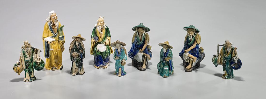 Nine Old & Antique Pottery Mudmen (1 of 1)