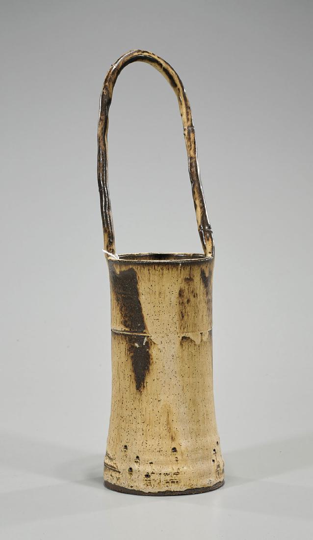 Antique Japanese Bamboo-Form Pottery Vase: Antique Japanese pottery vase; of cylindrical bamboo form, with tall handle; showing moulded detailing throughout; Provenance: Collection of Stuart H. Salsbury; H: 13 5/8" (approx.)