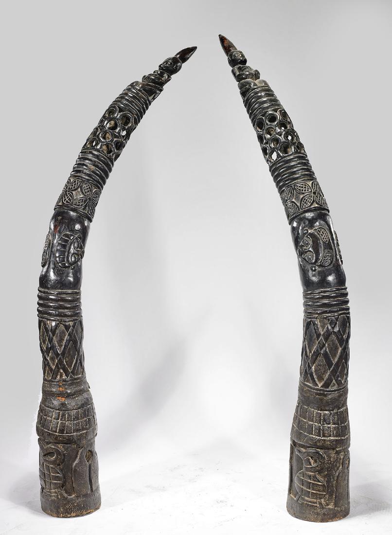 Pair Large African Wood Figural 'Tusks' (1 of 1)