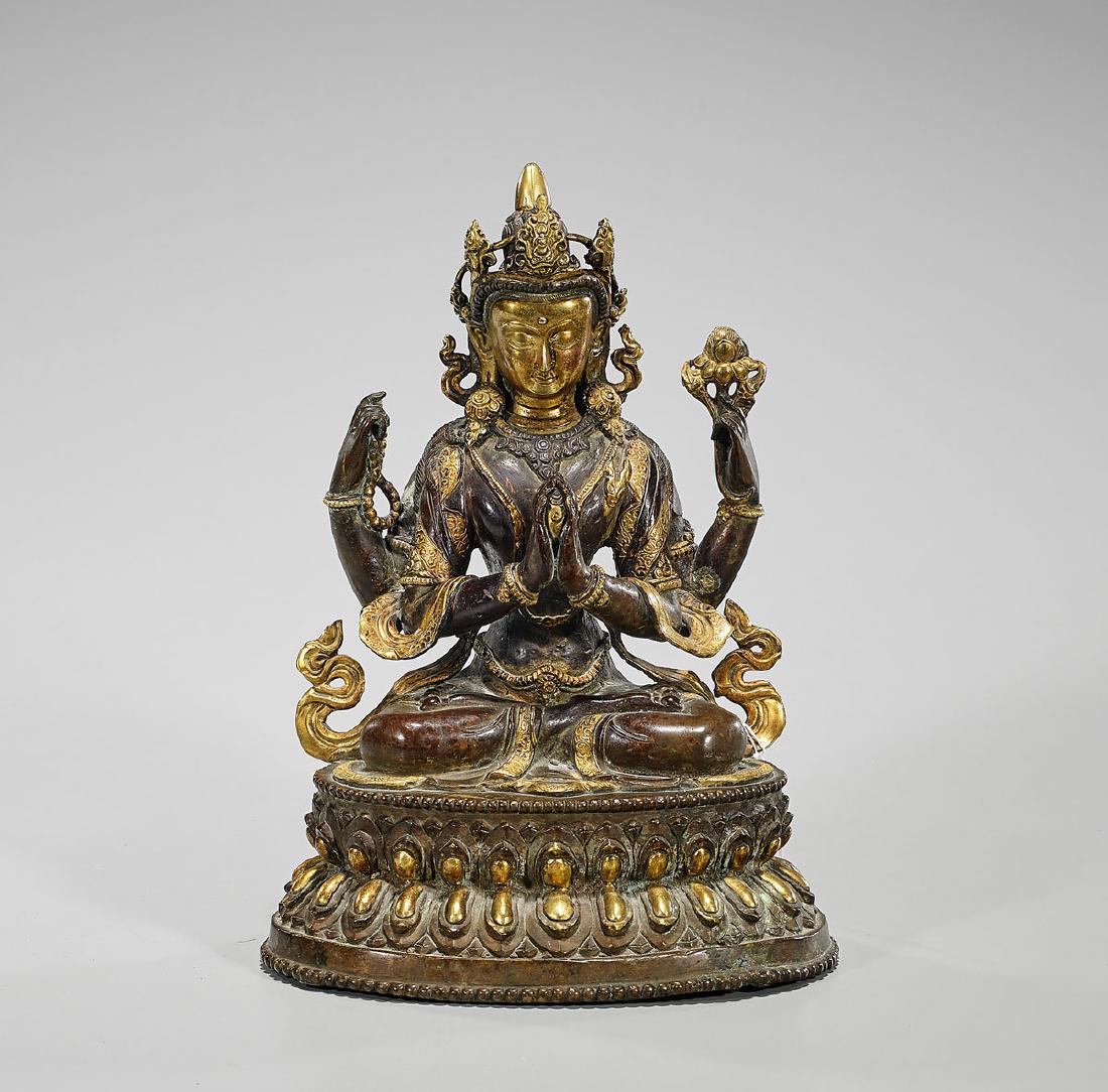 Antique Sino-Tibetan Parcel-Gilt Bronze Figure of a (1 of 2)