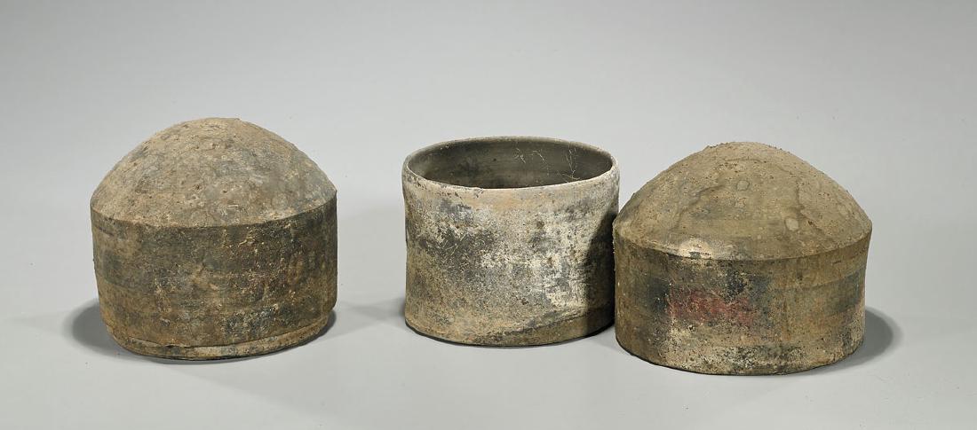Pair Han Dynasty Covered Pottery Urns: Pair of Chinese Han Dynasty covered pottery urns; each of cylindrical form with domed covers; with some original pigment remaining; Provenance: Collection of Stuart H. Salsbury; H: 8 1/4" (eac