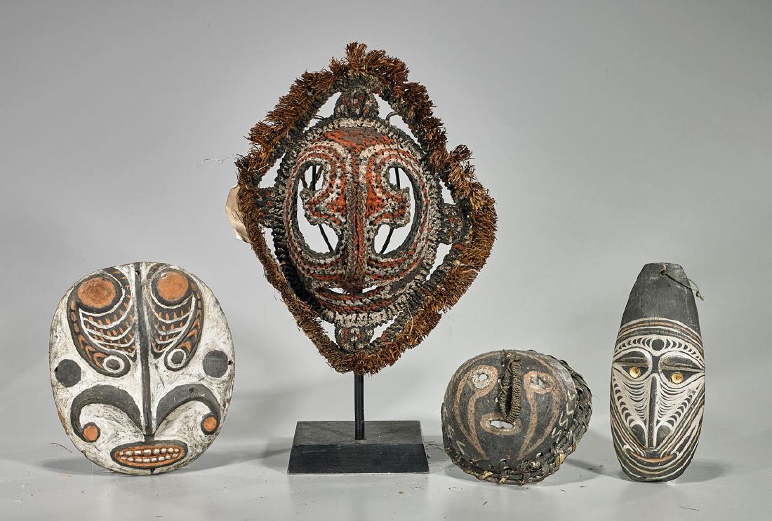 Four Small Papua New Guinea Masks (1 of 1)