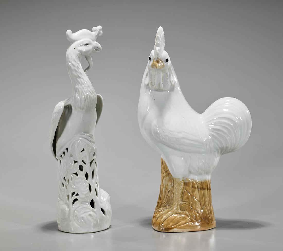 Two Chinese Porcelain Birds: Two Chinese porcelains, including: blanc de chine model of phoenix perched atop openwork design of lotus flowers; together with parcel-glazed model of a rooster atop rockery; H: 14" (tallest, 
