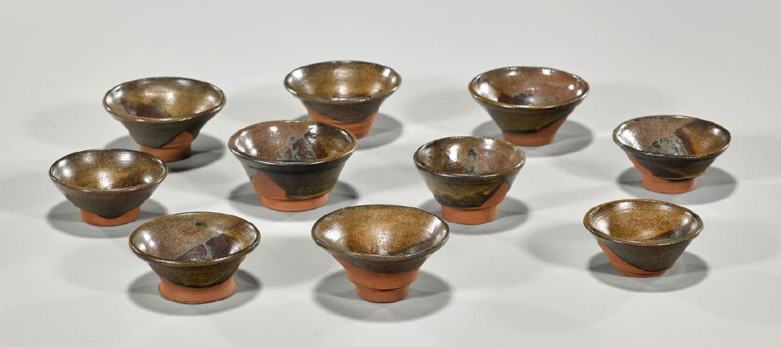 Group of Ten Small Song-Style Tea Bowls: Group of ten small Song-style tea bowls; each of slight-conical form with stepped bases; with parcel brown glaze; D: 3 1/4" (largest, approx.)