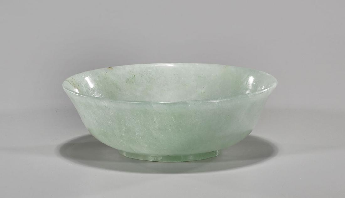 Thinly Carved Chinese Stone Bowl: Chinese thinly carved bowl, possibly aventurine quartz; of wide flared form set on a small foot; the stone of translucent mottled green showing aventurescence and inclusions; D: 5 1/2" (approx