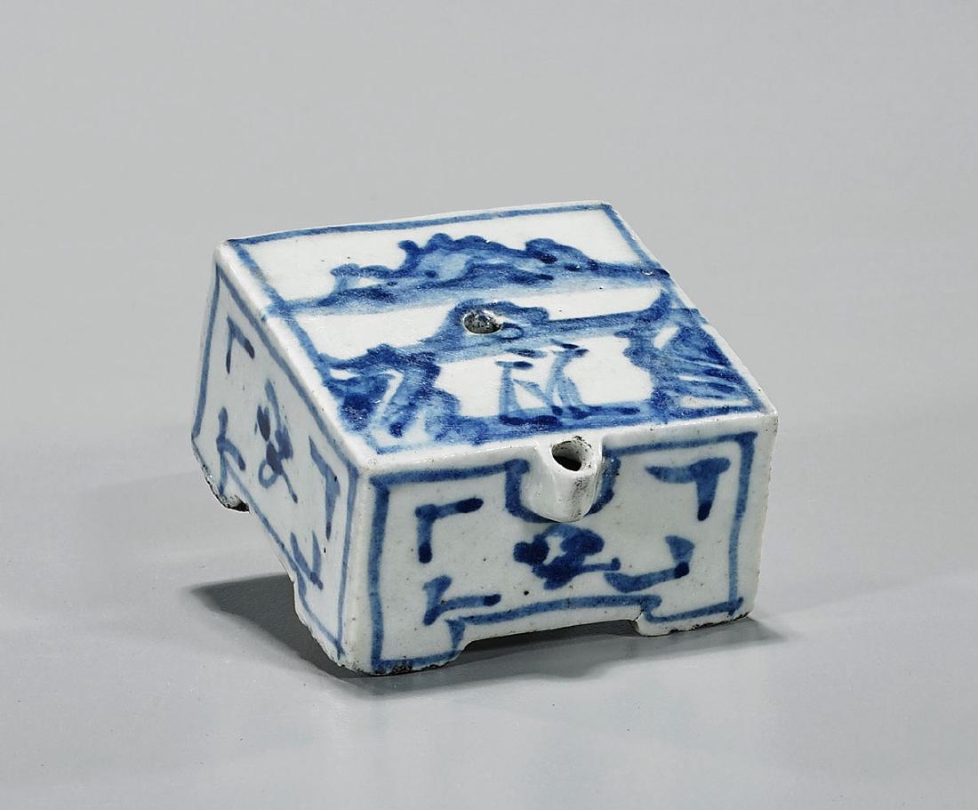 Antique Korean Blue & White Porcelain Waterdropper: Antique Korean Joseon Dynasty blue and white porcelain waterdropper; of rectangular form; showing landscape design and auspicious symbols; 2 1/2" x 2 1/2" x 1 3/8" (approx.)