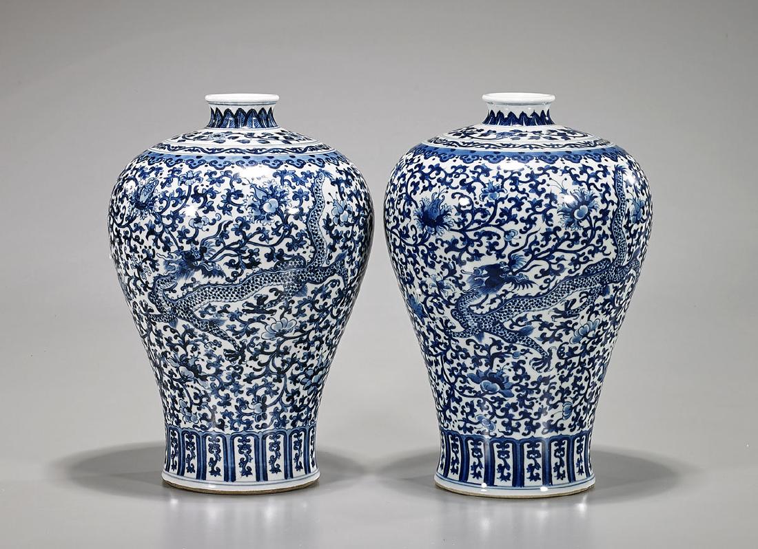 Pair Chinese Blue & White Porcelain Meiping Vase: Pair of Chinese blue and white porcelain vase; each of meiping form; showing dragon and phoenix amid dense scrolling flora motifs; with six-character Yongzheng mark to base, but later; H: 11 1/2" 