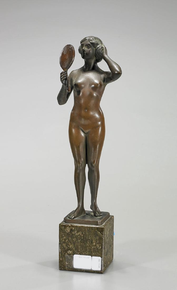 Bronze By H. Rieder: Bronze by H. Rieder; showing a standing nude female; holding a hand mirror; atop a rectangular stone plinth; H: 12 1/2" (overall, approx.)