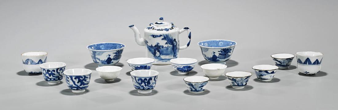 Group of Sixteen Antique Chinese Blue & White: Group of sixteen antique Chinese blue and white porcelain items, including: teapot with moulded detailing to top and figural scene to face and verso; together with pair of bowls showing continuous fig