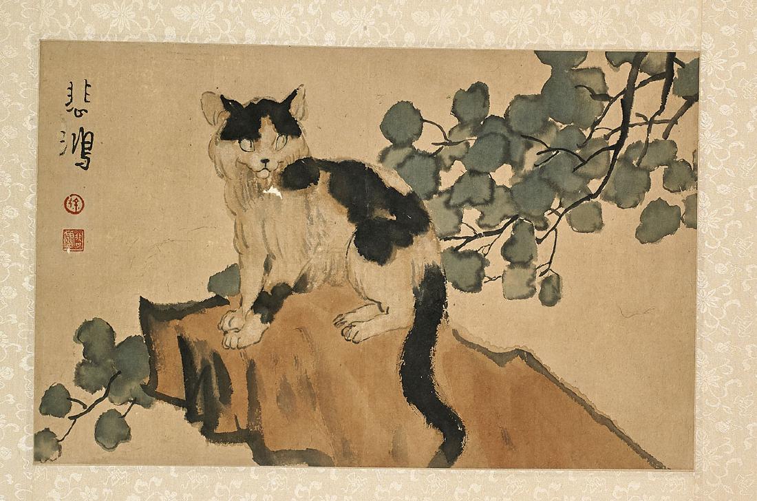 Chinese Painting After Xu Beihong: Chinese ink and color painting on paper after Xu Beihong; depicting cat seated atop rockery; signed, with seal marks; 11" x 18" (approx.)