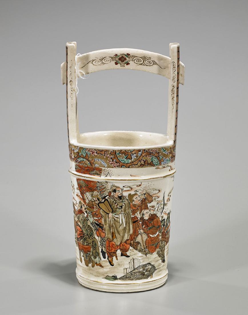 Antique Japanese Satsuma Earthenware Bucket: Antique Japanese satsuma earthenware bucket; of tapered cylindrical form, with elongated handles; showing a continuous figural scene to body; H: 12 1/2" (approx.)