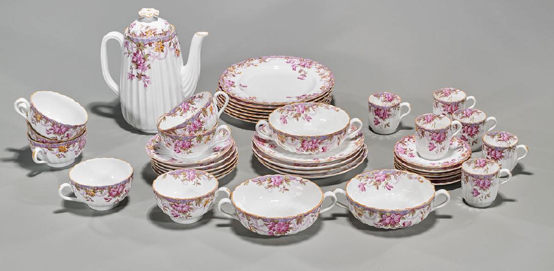 Collection of Spode's Irene Bone China Tableware: Collection of 38 Spode's Irene bone china tableware, each exhibiting pink floral designs to fluted rims, including: covered teapot; 7 luncheon plates; 3 bouillon cups and underplates; 6 tea cups a