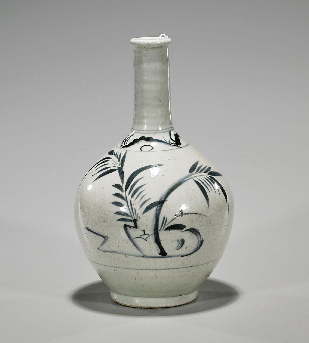 Antique Korean Blue & White Porcelain Bottle Vase: Antique Korean Joseon Dynasty blue and white porcelain bottle vase; showing various foliate motifs to body and shoulder; H: 11" tallest, approx.