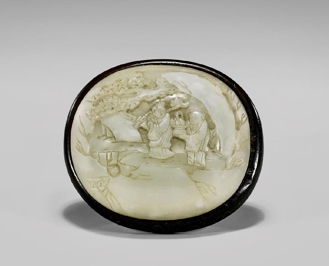 19TH CENTURY CARVED WHITE JADE PLAQUE: Chinese carved white jade plaque; the domed, ovoid form showing relief scene of two figures amid pines and rockery; the jade of even coloration and translucency; 19th Century; Provenance: Collection o