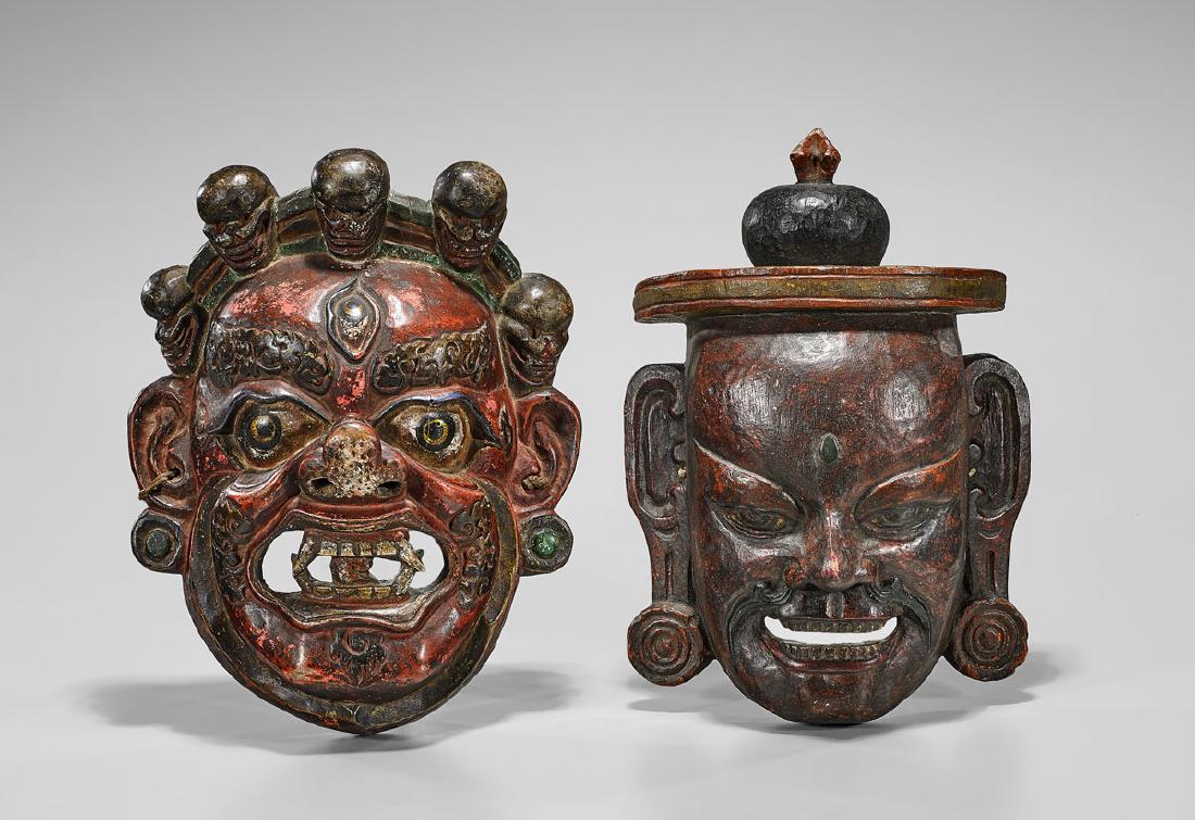 TWO TIBETAN POLYCHROME DANCE MASKS (1 of 2)