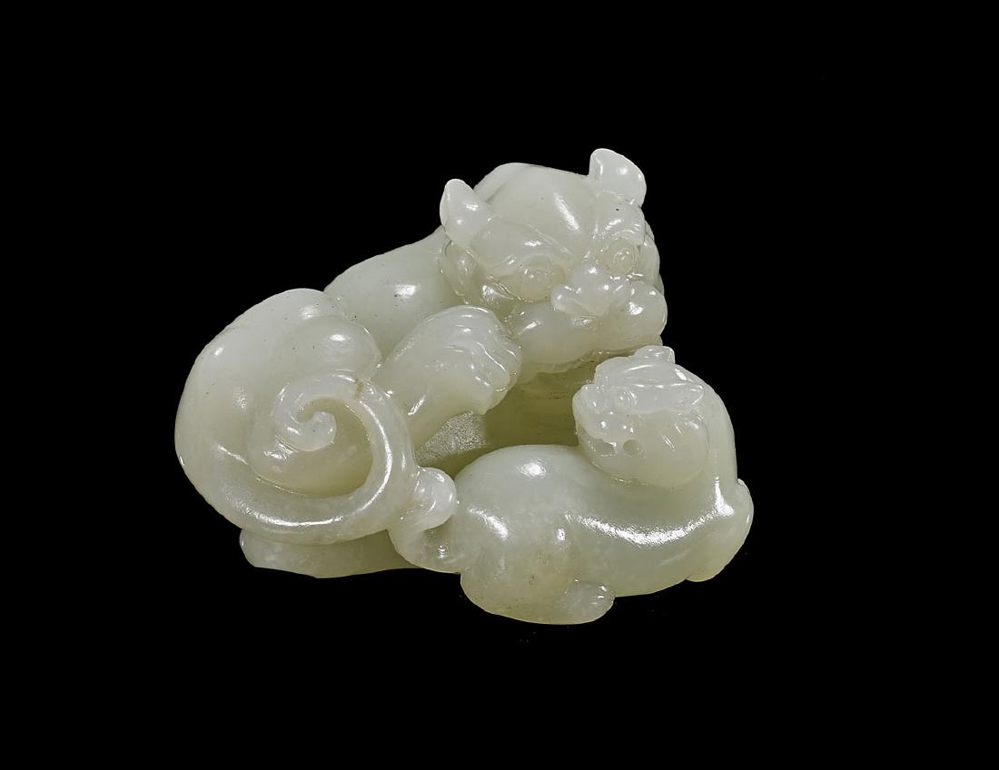 CARVED CELADON JADE LION GROUP (1 of 1)