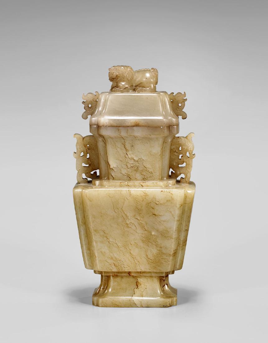 CARVED JADE COVERED URN