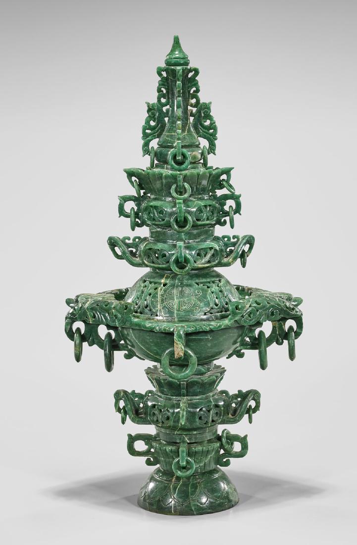TALL CARVED HARDSTONE CENSER: Tall Chinese carved hardstone covered censer; of elaborate tiered form, pending numerous loose rings; H: 25 1/2" (approx.)