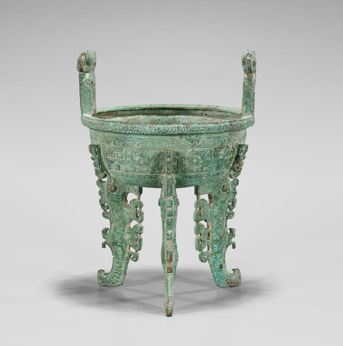 ARCHAISTIC BRONZE TRIPOD CENSER: Archaistic Chinese bronze tripod censer; H: 12"