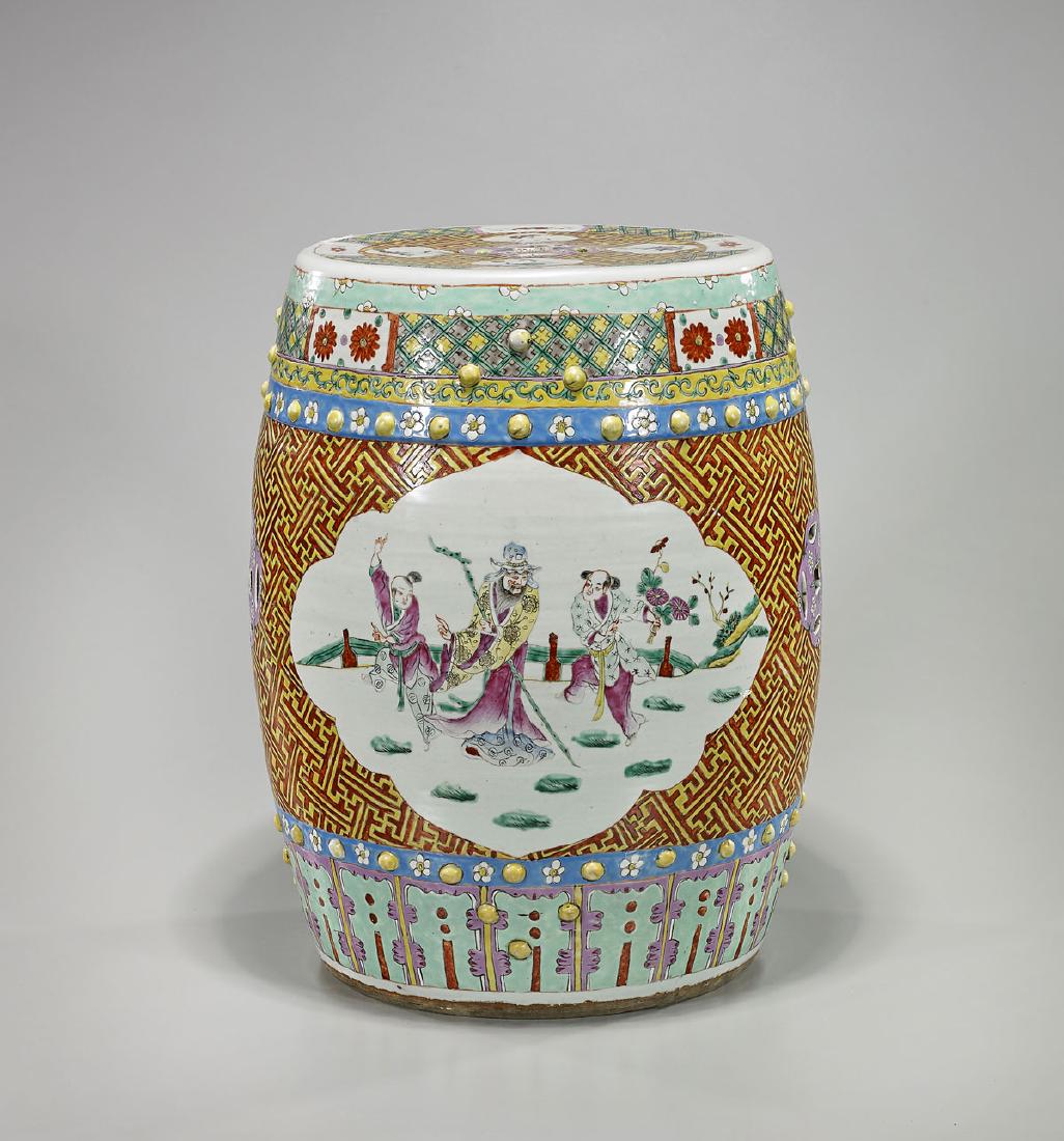 Large Chinese Enameled Porcelain Garden Seat: Large Chinese enameled porcelain garden seat; showing figural scenes within panels reserved on a red and yellow patterned ground; Provenance: Estate of Ben and Dorothy Smith; H: 18" (approx.&#