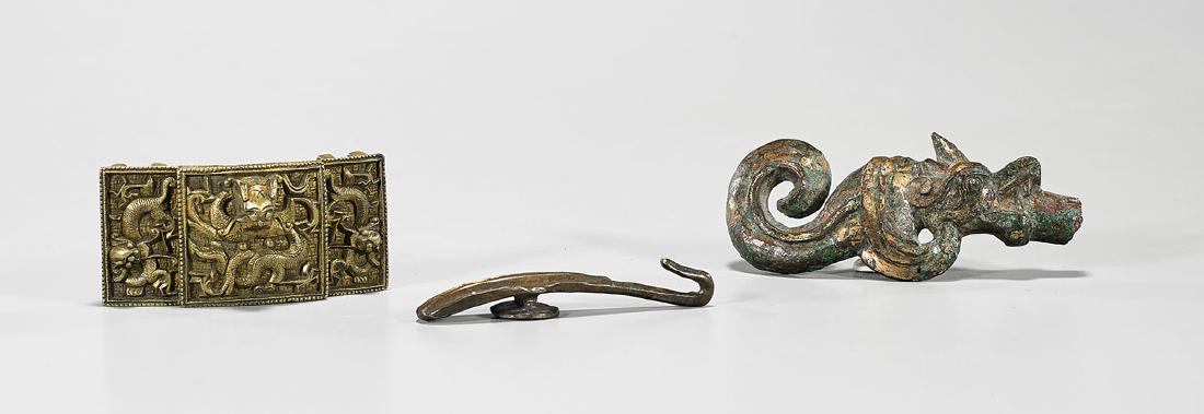 Group of Three Chinese Metalwork Buckles: Group of three Chinese metalwork buckles; Provenance: Private collection, Beverly Hills; L: 3 3/4" (longest, approx.)