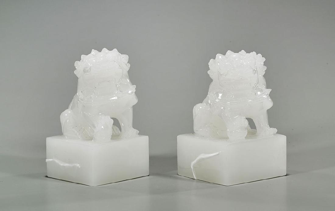 Pair Chinese Glass-Imitating-Jade Fo Lion Seals: Pair of Chinese glass-imitating-jade Fo lion seals; Provenance: Private collection, Beverly Hills; H: 5 1/2" (each, approx.)