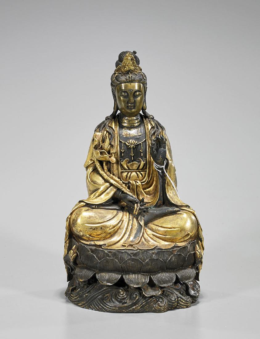 Chinese Parcel-Gilt Bronze Figure of Guanyin: Chinese parcel-gilt bronze figure of Guanyin; Provenance: Private collection, Beverly Hills; H: 11 1/2" (approx.)