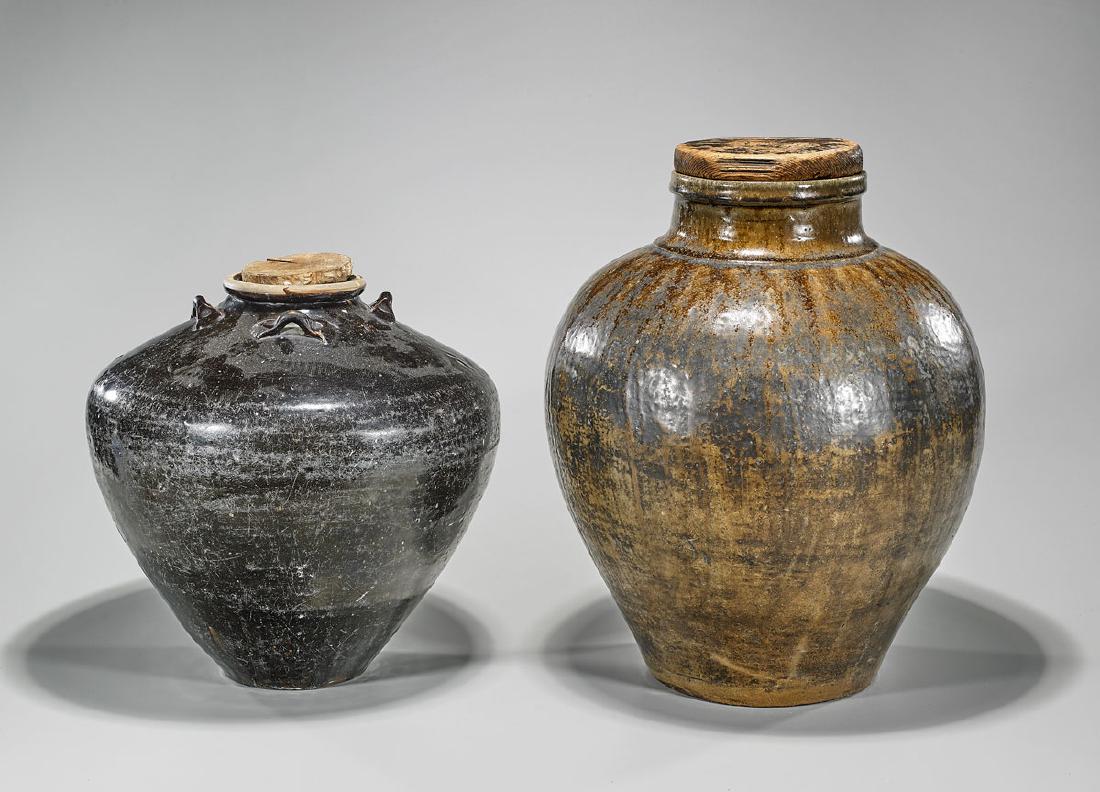 Two Large Antique Japanese Edo Period Glazed Jars: Two large antique Japanese Edo Period glazed jars: seto ware; together with tokoname ware; both with later wood covers; Provenance: Collection of Dr. Robert Ramsey; H: 17 1/2" (tallest, approx