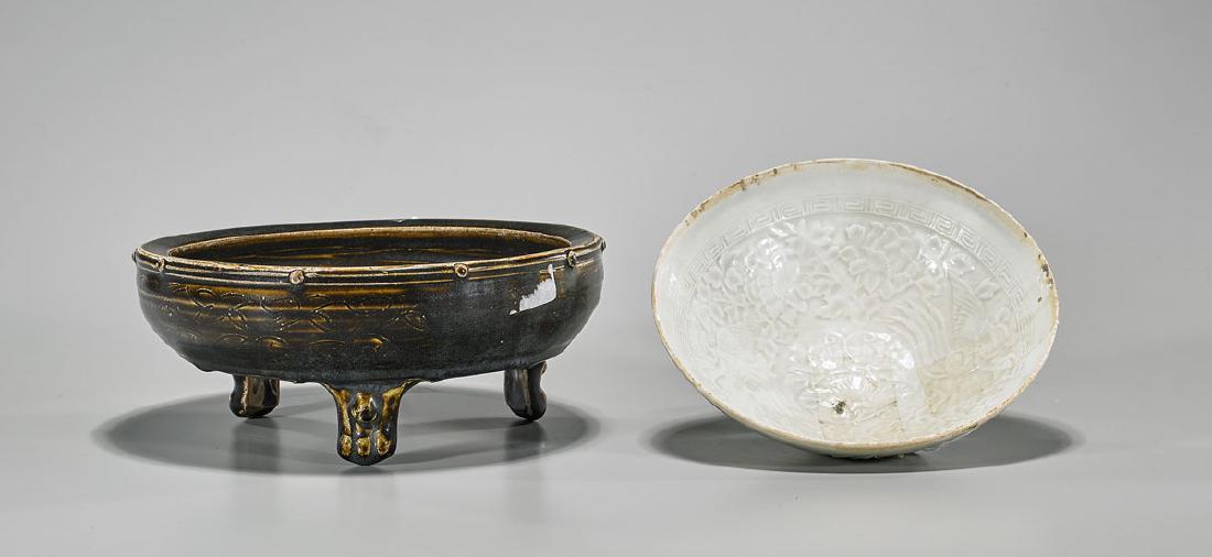 Two Chinese Song-Style Ceramics: Two Chinese Song-style ceramics: qingbai glazed moulded bowl; together with brown glazed basin atop three moulded feet; D: 8 1/2" (widest, approx.)