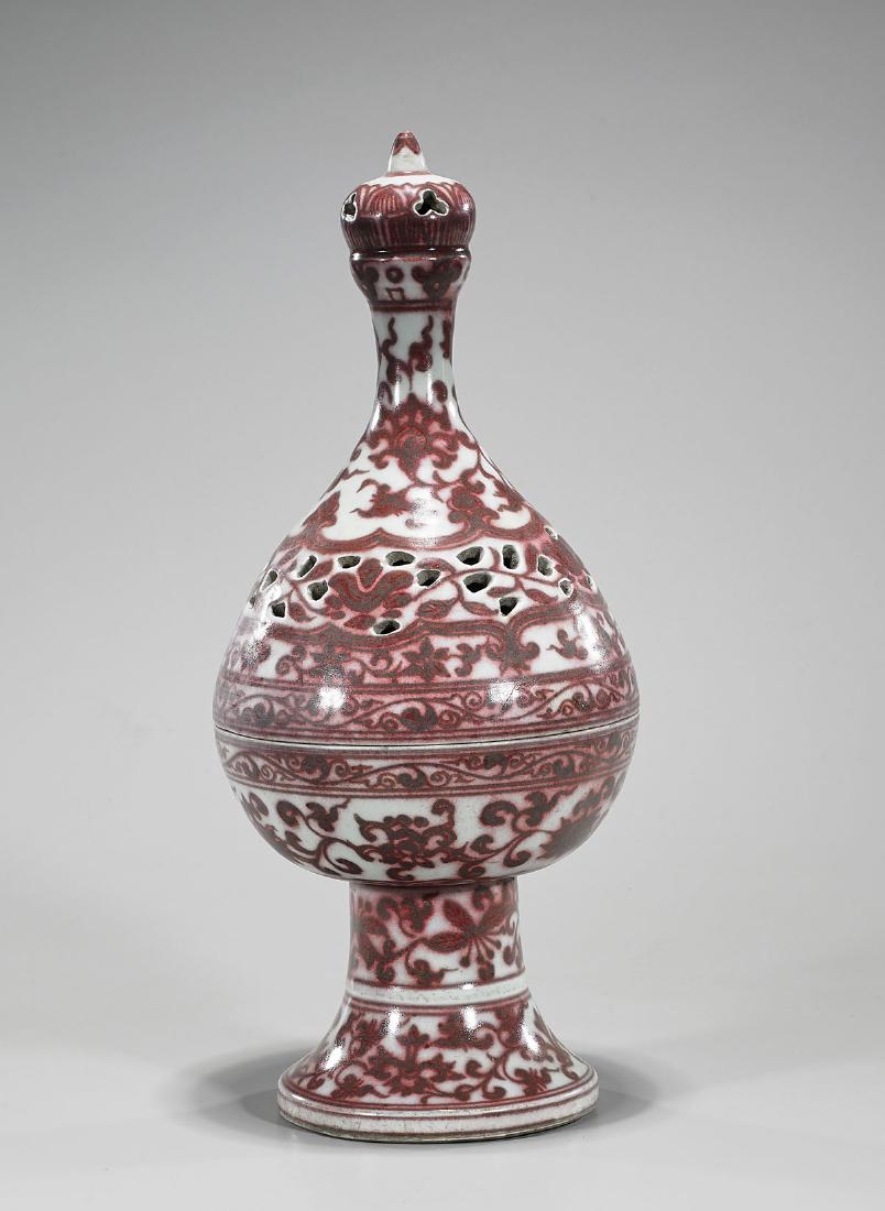Tall Chinese Iron-Red Glazed Porcelain Censer: Tall Chinese Ming-style iron-red glazed porcelain pierced covered censer; H: 17 1/2" (approx.)