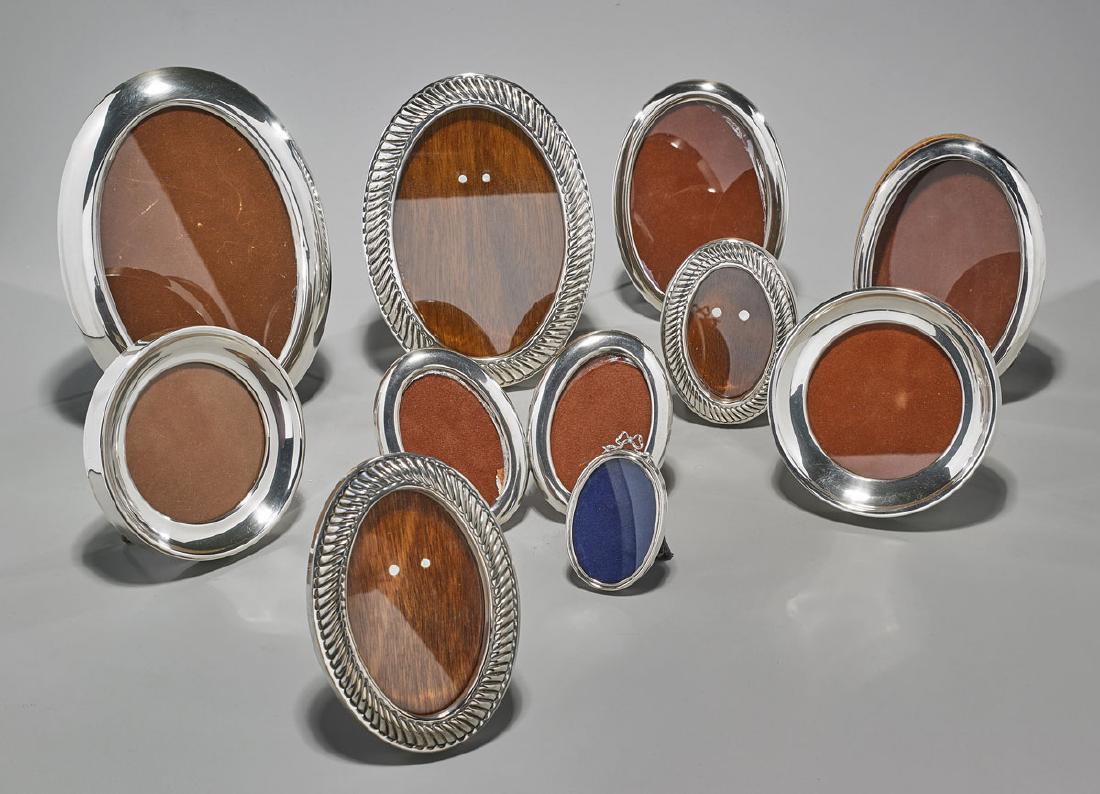 Group of Ten Sterling Silver Picture Frames: Group of ten sterling silver picture frames; one stamped Cartier; the rest stamped MEXICO; each mounted on wood, and stamped 925 / STERLING to verso; Provenance: Estate of Rafael de Marchena-Huyke; 6