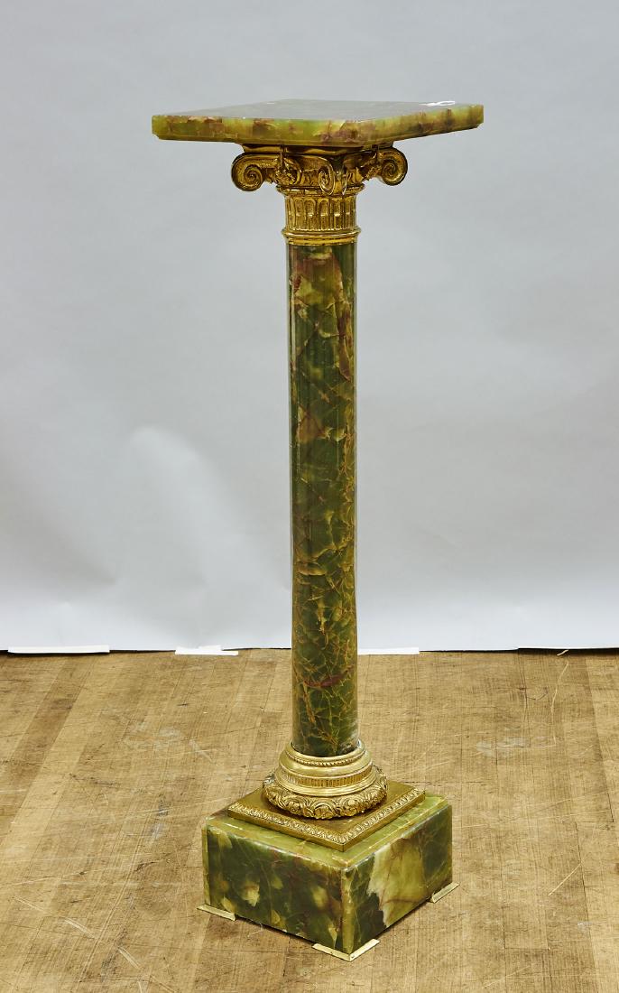 Ormolu-Mounted Onyx Pedestal: Ormolu-mounted onyx pedestal; the stone of mottled green coloration, with brown suffusions; Provenance: Estate of Rafael de Marchena-Huyke; H: 43" (approx.)