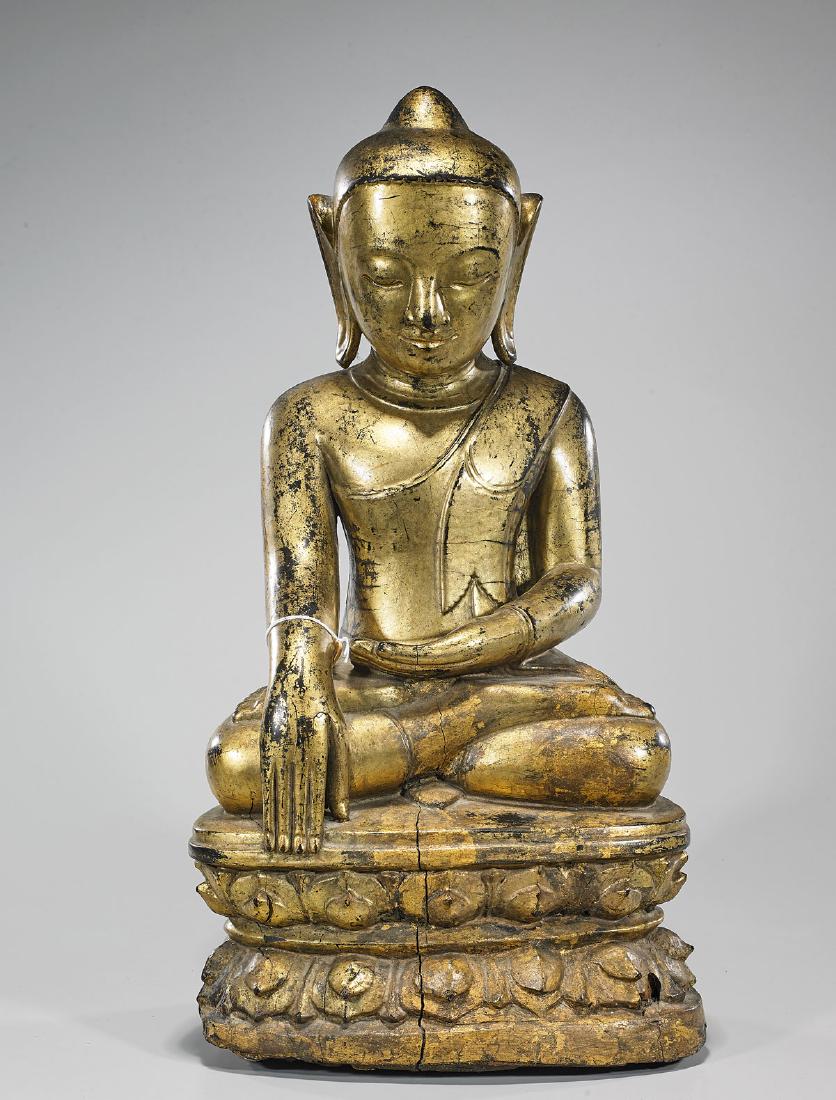 Large Antique Thai Gilt Wood Seated Buddha: Large antique Thai gilt wood Buddha; seated atop a double lotus base; H: 22" (approx.)